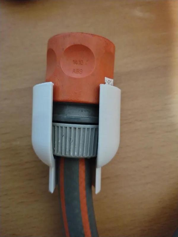 Wall holder for 17mm water hose with connector   