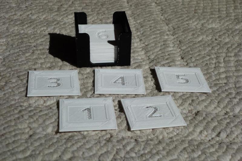 Dummy slides for separating rolls of film in a carousel