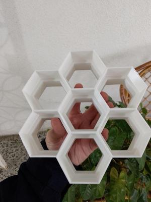 Hexagon shaped donut cutter with 7 pieces per cut