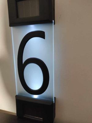Solar house number on glass