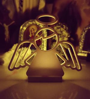 Angel with attitude candle holder