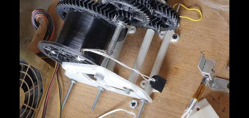 amarre para filamento y carrete de maquina de filamento