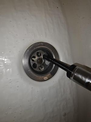 Shower hose nozzle for drain cleaning
