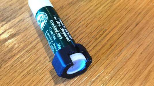Lip balm rotor guard