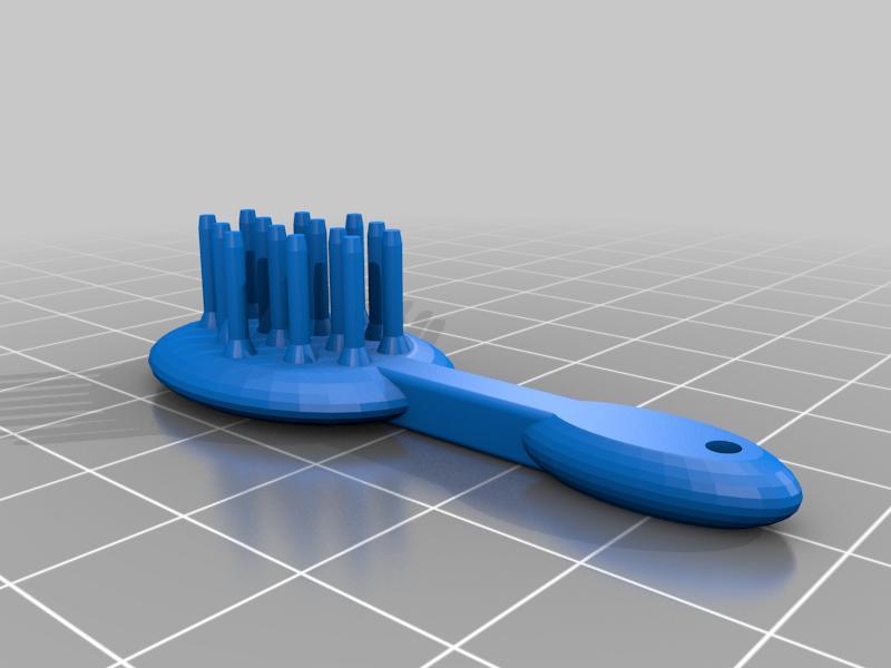 Doll brush with balls on bristles