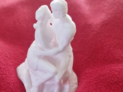 3D sculpture of two Greek gods kissing