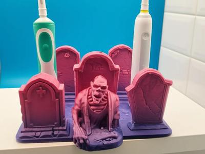Creepy and zombie toothbrush holder tomb