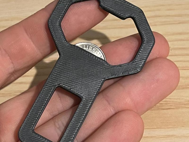Bottle opener seat belt clip