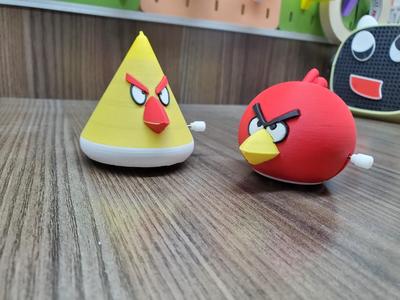 Two kinetic birds that run and rotate