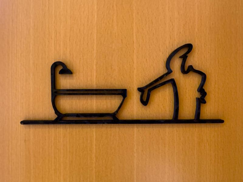 The Line bathroom sign (La Linea)