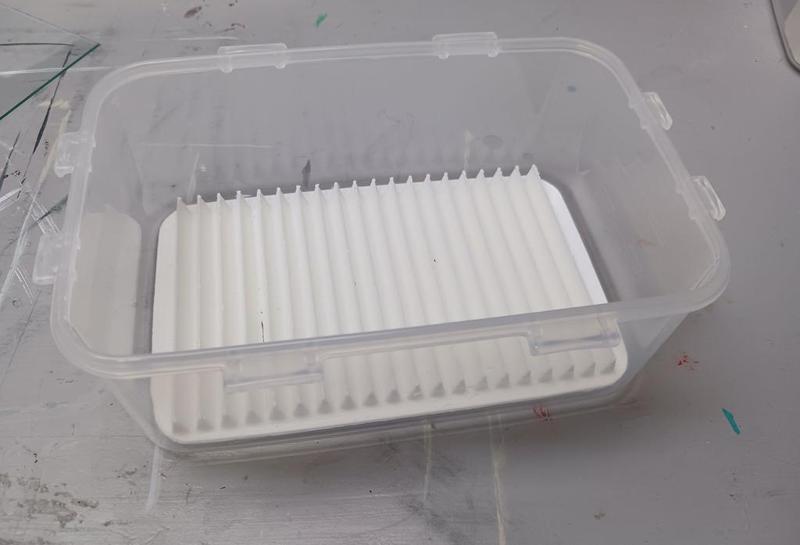 Ribbed brush cleaner.