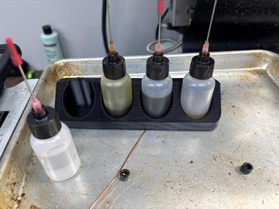 Needle oiler bottle stand