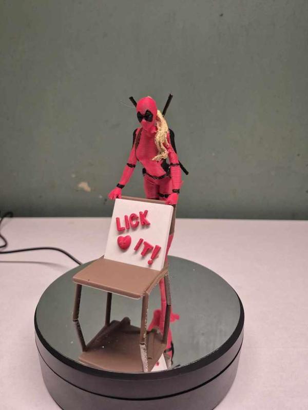 lady deadpool lick it sign