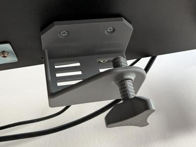 Monitor or laptop adapter holder under the desk