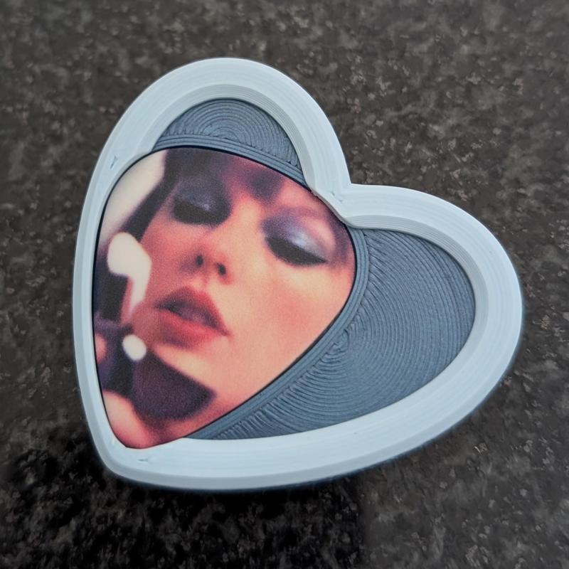 Heart shaped guitar pick holder