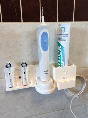 Braun Oral-B wall mount charger and toothbrush holder