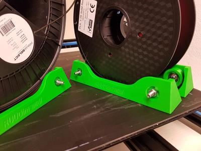 Spool holder with rollers