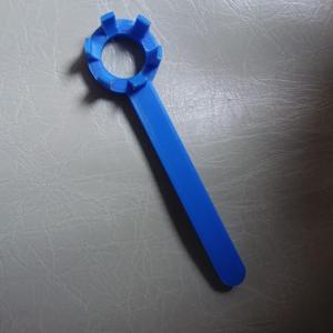 Wrench for swimming pool discharge nozzle