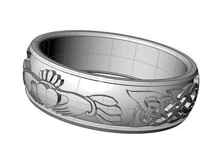 Claddagh ring with braided celtic style ornament