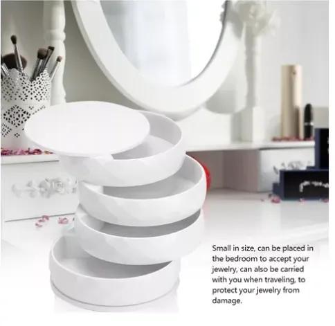 rotatory jeweler with 5 storage trays   