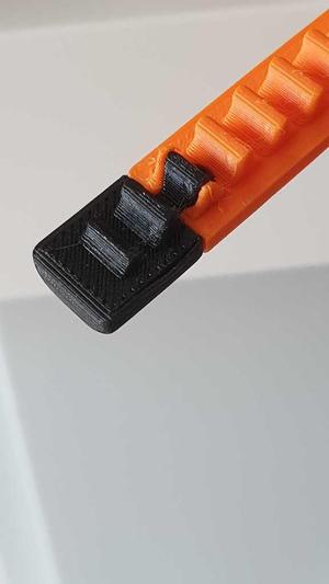 Silencer tracks for the Multiple Mechanism Auto-Rewind Spool Holder