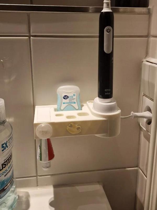 toothbrush holder and toothpaste dispenser combined   