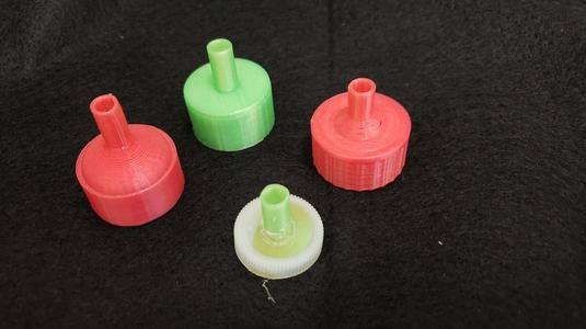 Bottle top straw launcher