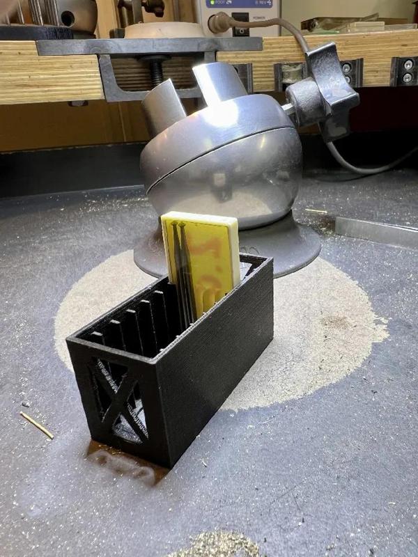 Holder for burr boxes   