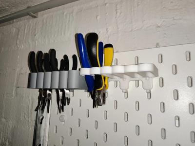Skadis holder for nippers and scissors   