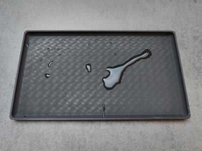 Water-drop-catcher for silverware basket