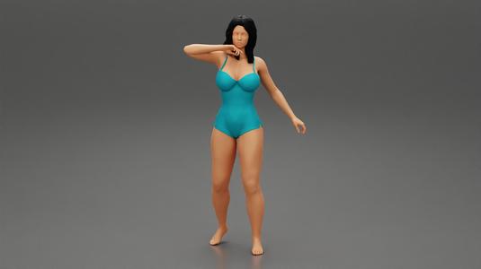 Beautiful young woman wearing a trendy one-piece swim suit