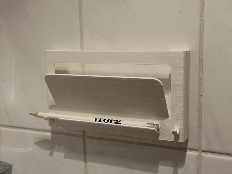 Puzzle bookshelf with place for pencil and towel.