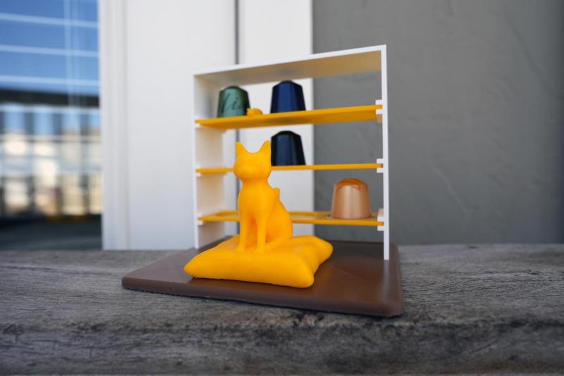 Desk shelf for Nespresso pods with a cat and a rat