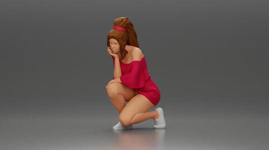 fashionable girl in beachwear is sitting and looking