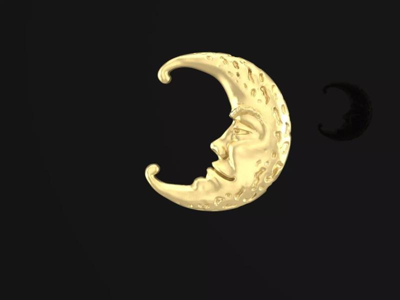the moon gold crescent with face