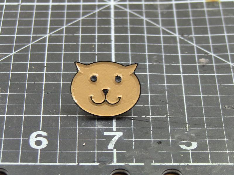 cat head enamel pin