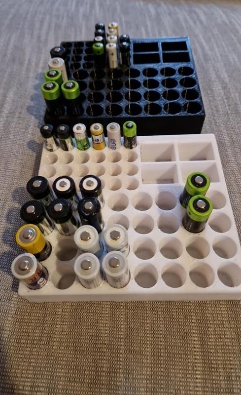 Battery Holder AA + AAA + 9V  (scad file for openscad included)