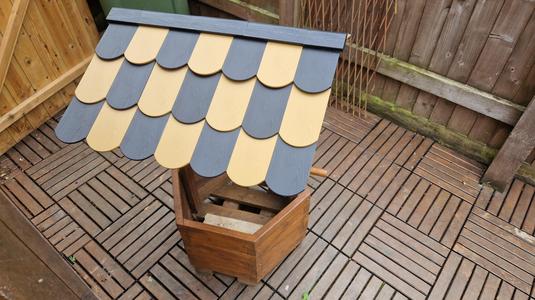 Roof tile with wood texture