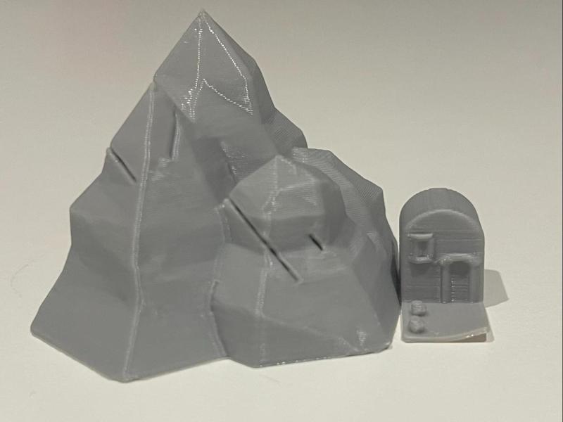 Mountain with small house