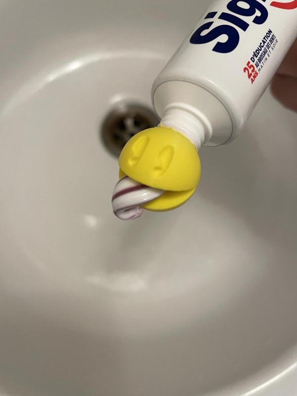 Pac-Man vomiting toothpaste.