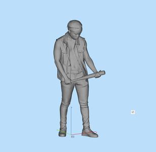 Man looking down at baseball bat