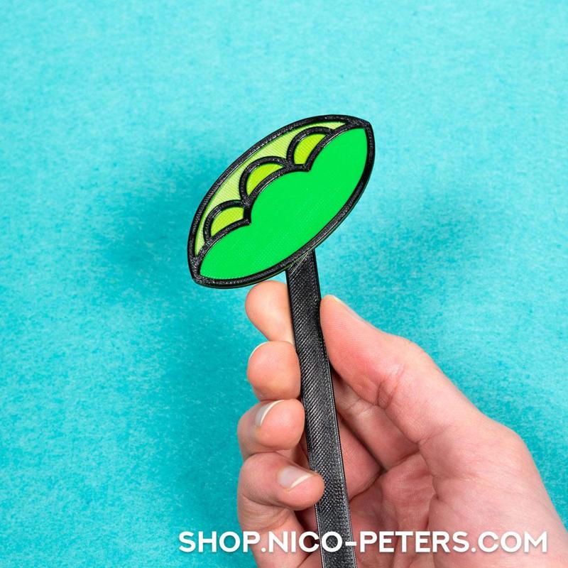 Plant sign peas - garden