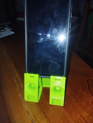 cell phone cradle with audio