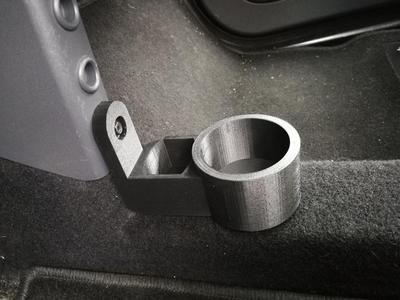 A cup/drink holder for Smart Fortwo 450.