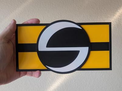 The Sentry Emblem + Stand