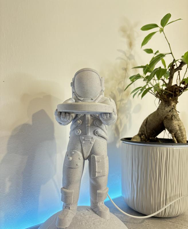 Astronaut magsafe charger holder