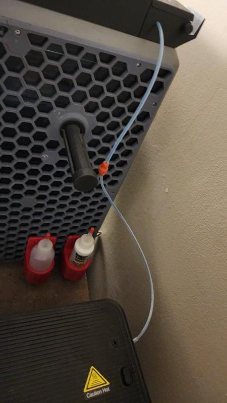 Magnetic coupler for reverse bowden PTFE tube