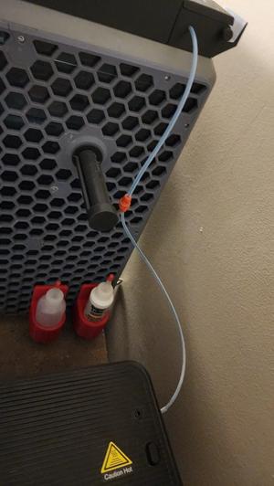 Magnetic coupler for reverse bowden PTFE tube