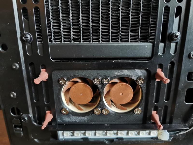 Mounting plate for extra cooling fans in PC casing