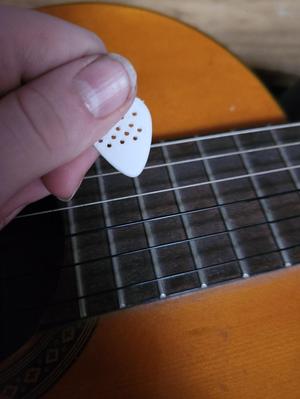 Guitar pick but grippy